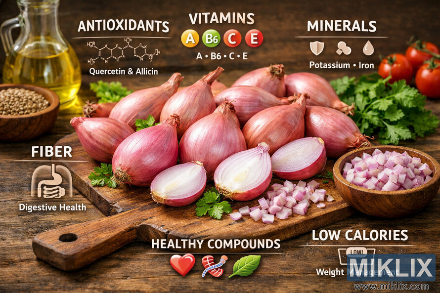 A high-resolution landscape photograph of fresh shallots on a rustic wooden table, surrounded by parsley, cherry tomatoes, and labeled nutritional elements such as antioxidants, vitamins, minerals, fiber, and low calories.