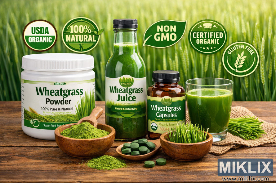 High-resolution landscape photo of assorted wheatgrass products on a rustic wooden surface, including a large white container of wheatgrass powder with a wooden bowl of bright green powder and a scoop, a tall green glass bottle of wheatgrass juice, an amber bottle of wheatgrass capsules, a clear glass filled with vivid green wheatgrass juice, a small bowl of fresh wheatgrass sprouts, a wooden spoon holding green wheatgrass tablets, and a small pile of freshly cut wheatgrass. The products are surrounded by stylized green and white certification-style badges indicating organic, natural, non-GMO, certified organic, and gluten-free qualities, all set against a softly blurred background of a lush green wheatgrass field. High-resolution landscape photo of assorted wheatgrass products on a rustic wooden surface, including a large white container of wheatgrass powder with a wooden bowl of bright green powder and a scoop, a tall green glass bottle of wheatgrass juice, an amber bottle of wheatgrass capsules, a clear glass filled with vivid green wheatgrass juice, a small bowl of fresh wheatgrass sprouts, a wooden spoon holding green wheatgrass tablets, and a small pile of freshly cut wheatgrass. The products are surrounded by stylized green and white certification-style badges indicating organic, natural, non-GMO, certified organic, and gluten-free qualities, all set against a softly blurred background of a lush green wheatgrass field.
