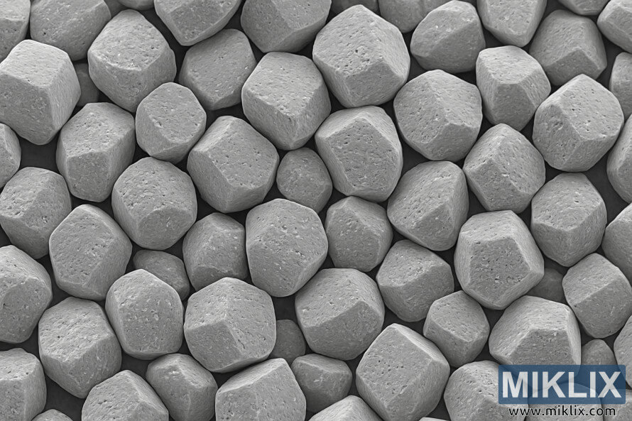 Elektronmikrografi av majsstärkelsegranulat som visar polygonala former och texturerade ytor. Elektronmikrografi av majsstärkelsegranulat som visar polygonala former och texturerade ytor.